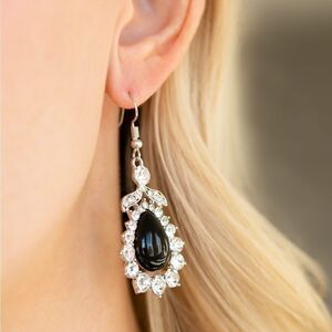 White rhinestone with black tear drop stone center